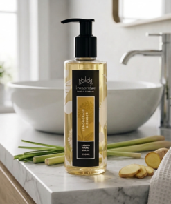 Lemongrass & Ginger 250ml liquid hand wash styled in a bright bathroom setting with fresh lemongrass and ginger, creating an uplifting everyday hand-care experience