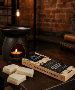 Dark Honey & Tobacco wax melt snap bar with warm smoky honey and tobacco fragrance, litstyle inmage showing wax melts with burner, handmade by Ironbridge Candle Company