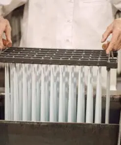 ester & erik taper candles in production