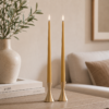 Lifestyle image showing ester & erik LED Taper Candles in 40cm length in colour Almond Butter