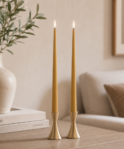 Lifestyle image showing ester & erik LED Taper Candles in 40cm length in colour Almond Butter