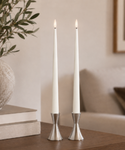 Lifestyle image showing ester & erik LED Taper Candles in 30cm length in colour Silky