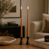 Lifestyle image showing ester & erik LED Taper Candles 40cm in length in colour: Raw Roffee
