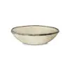 Close-up of the Malia Bowl - Cream by Nkuku, showing the cream stoneware surface, subtle glaze variation and fine hand-painted rim detail.
