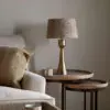 Marpha Antique Brass Table Lamp styled in a living space, bringing warm brass tones and understated character to the room.