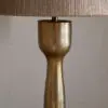 Detailed view of the Marpha Antique Brass Table Lamp, highlighting its traditional craftsmanship and antique brass texture.