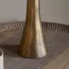 Detailed view of the Marpha Antique Brass Table Lamp, highlighting its traditional craftsmanship and antique brass texture.