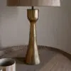Close-up of the Marpha Antique Brass Table Lamp showing the warm antique brass finish and refined sculptural detailing.