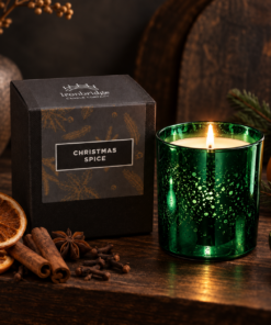 Christmas Spice Luxury Candle in emerald electroplated glass with branded gift box, dried orange, cinnamon, cloves and star anise.