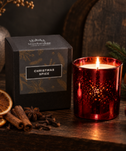 Christmas Spice Luxury Candle in ruby electroplated glass with branded box, dried orange, cinnamon, cloves and star anise.