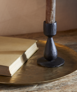Close-up of the Suba Candle Holder in Black by Nkuku showing the hand-forged textured iron finish.