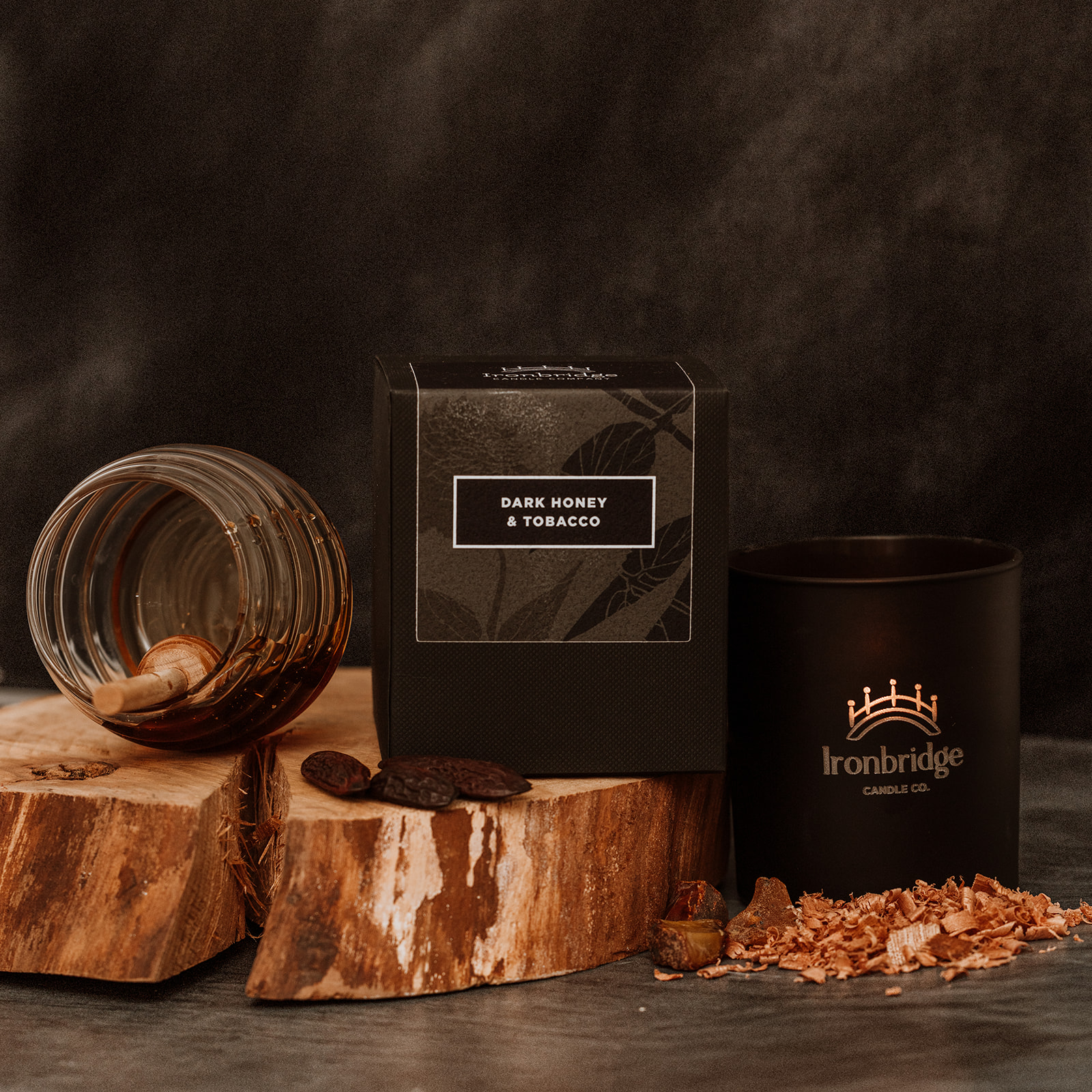 Warm smoky Dark Honey & Tobacco vegetable wax luxury candle in black etched matt glass with up to 45 hours burn time