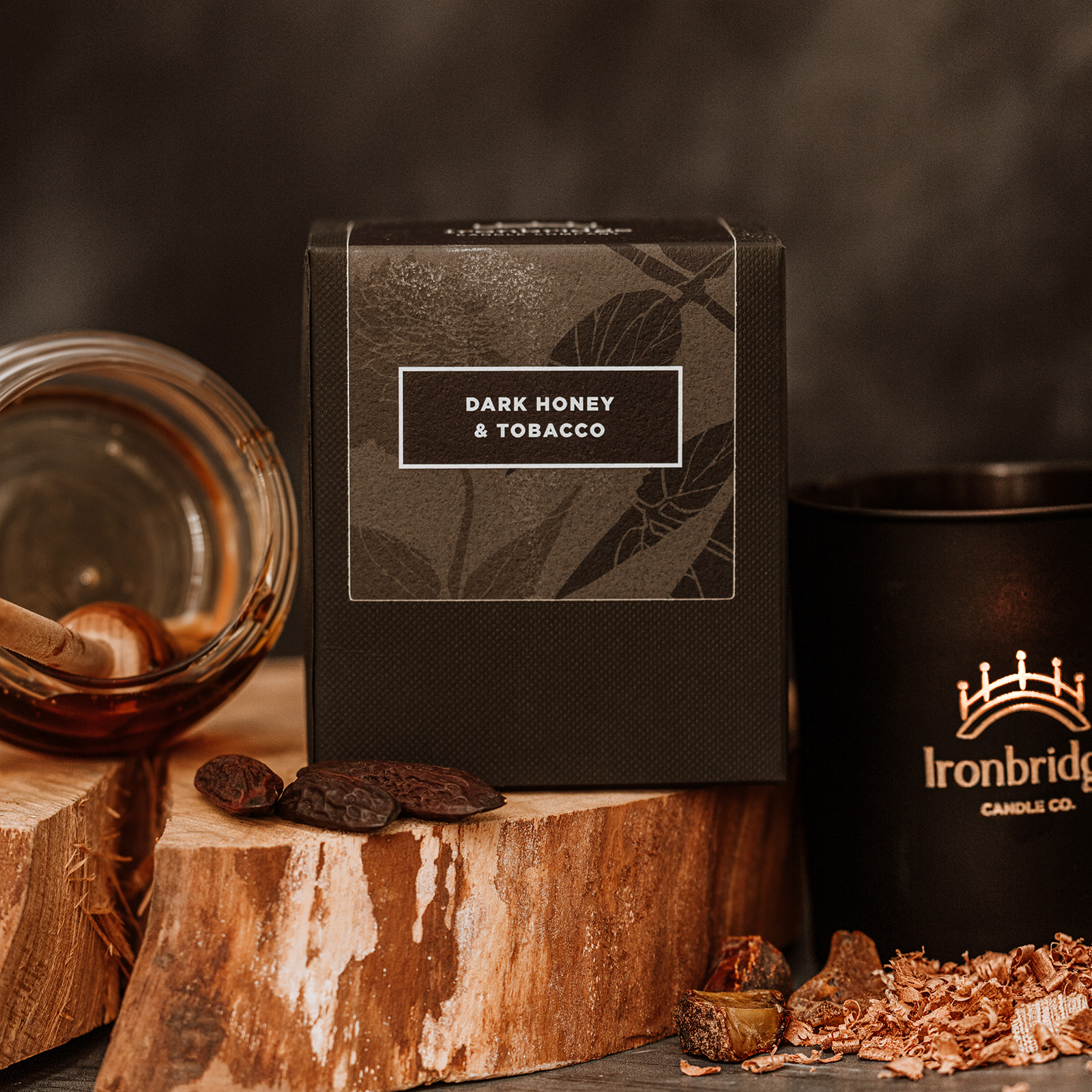 Warm smoky Dark Honey & Tobacco vegetable wax luxury candle in black etched matt glass with up to 45 hours burn time