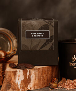 Warm smoky Dark Honey & Tobacco vegetable wax luxury candle in black etched matt glass with up to 45 hours burn time