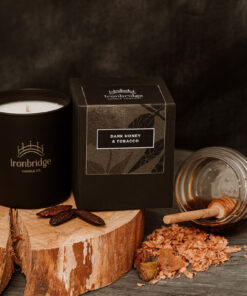 Warm smoky Dark Honey & Tobacco vegetable wax luxury candle in black etched matt glass with up to 45 hours burn time