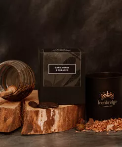 Warm smoky Dark Honey & Tobacco vegetable wax luxury candle in black etched matt glass with up to 45 hours burn time