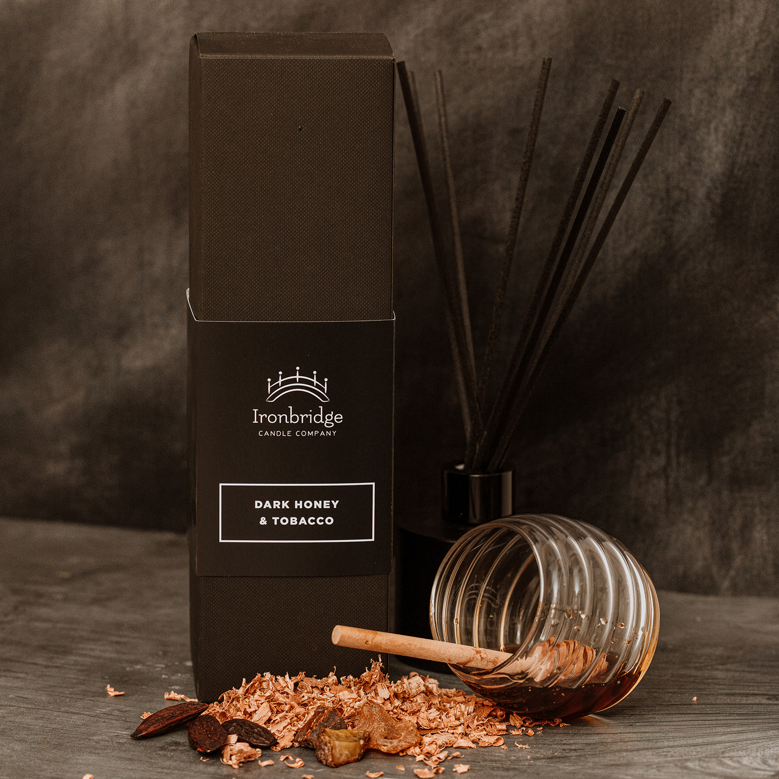 Close-up of Dark Honey & Tobacco reed diffuser luxury box
