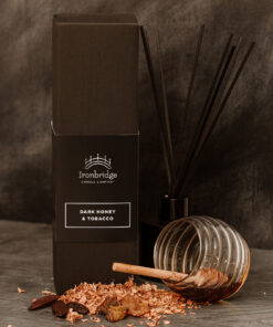 Close-up of Dark Honey & Tobacco reed diffuser luxury box