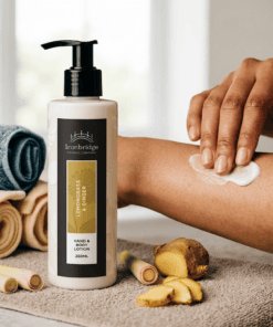 Lemongrass & Ginger hand and body lotion being massaged into the skin, with a fresh citrus fragrance and warming ginger notes for an uplifting daily body-care routine