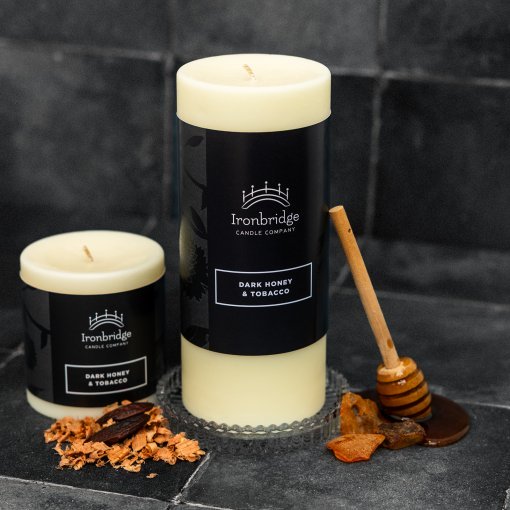 Small and medium Dark Honey & Tobacco soy blend wax pillar candles with warm smoky fragrance