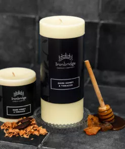 Small and medium Dark Honey & Tobacco soy blend wax pillar candles with warm smoky fragrance
