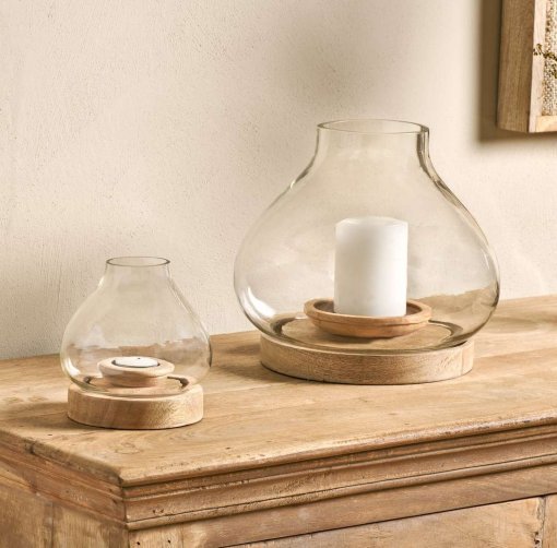 Naryla lantern with a recycled glass bulb shape that sits perfectly in a solid mango wood base