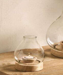 Small Naryla lantern with a recycled glass bulb shape that sits perfectly in a solid mango wood base