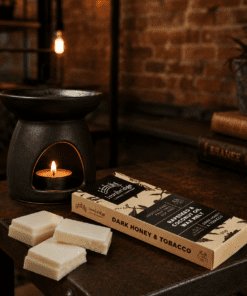 Dark Honey & Tobacco wax melt snap bar with warm smoky honey and tobacco fragrance, litstyle inmage showing wax melts with burner, handmade by Ironbridge Candle Company