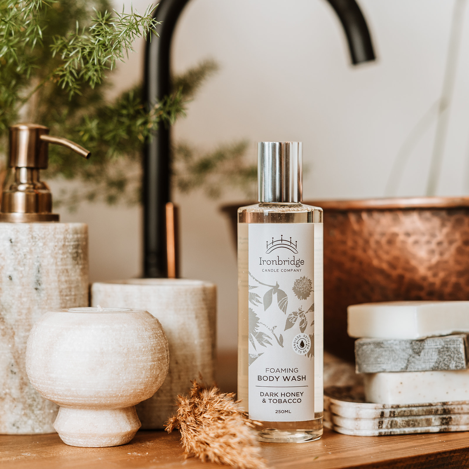 250ml Dark Honey & Tobacco foaming body wash with Aloe Vera and natural cleansing ingredients styled for luxury bath and shower