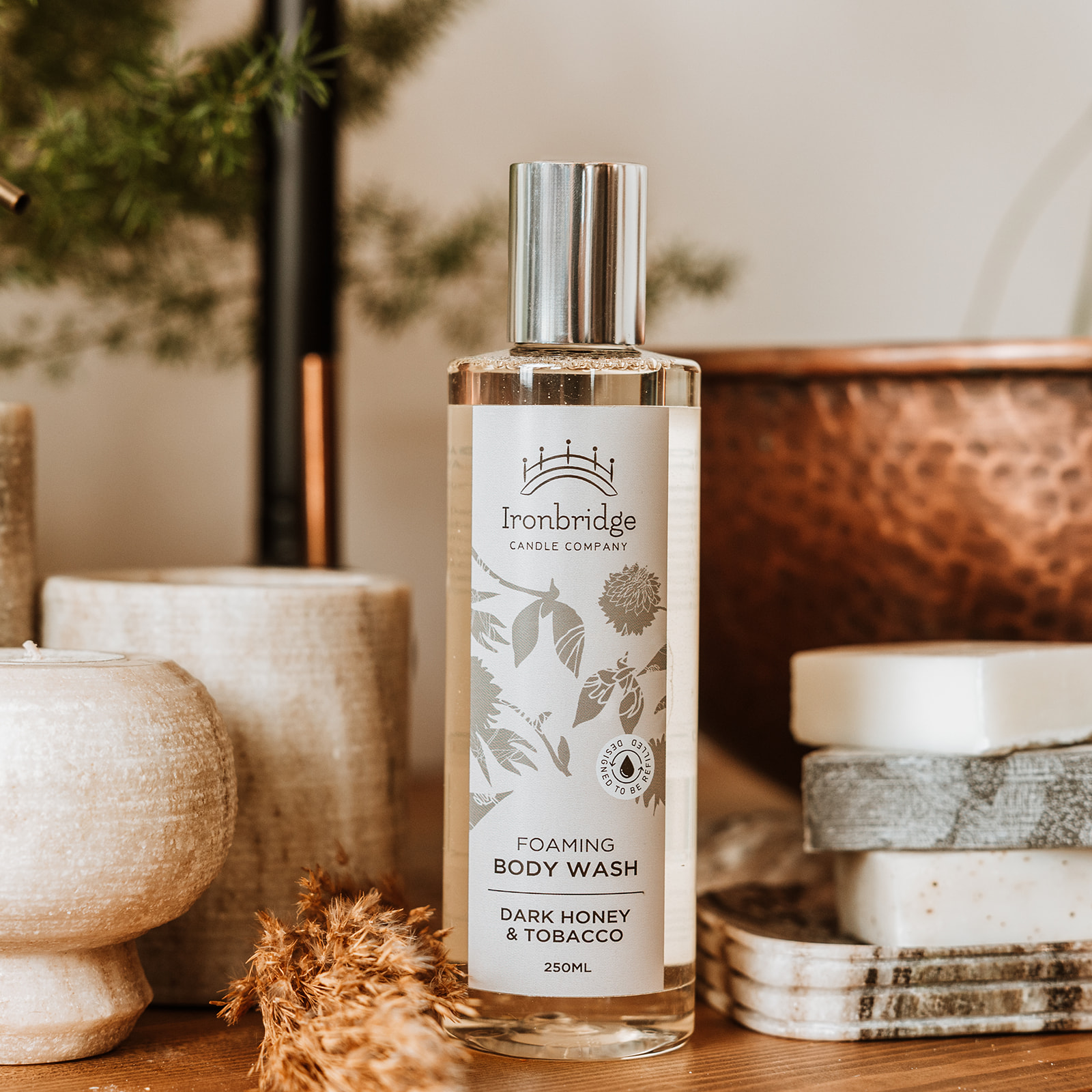 250ml Dark Honey & Tobacco foaming body wash with Aloe Vera and natural cleansing ingredients styled for luxury bath and shower