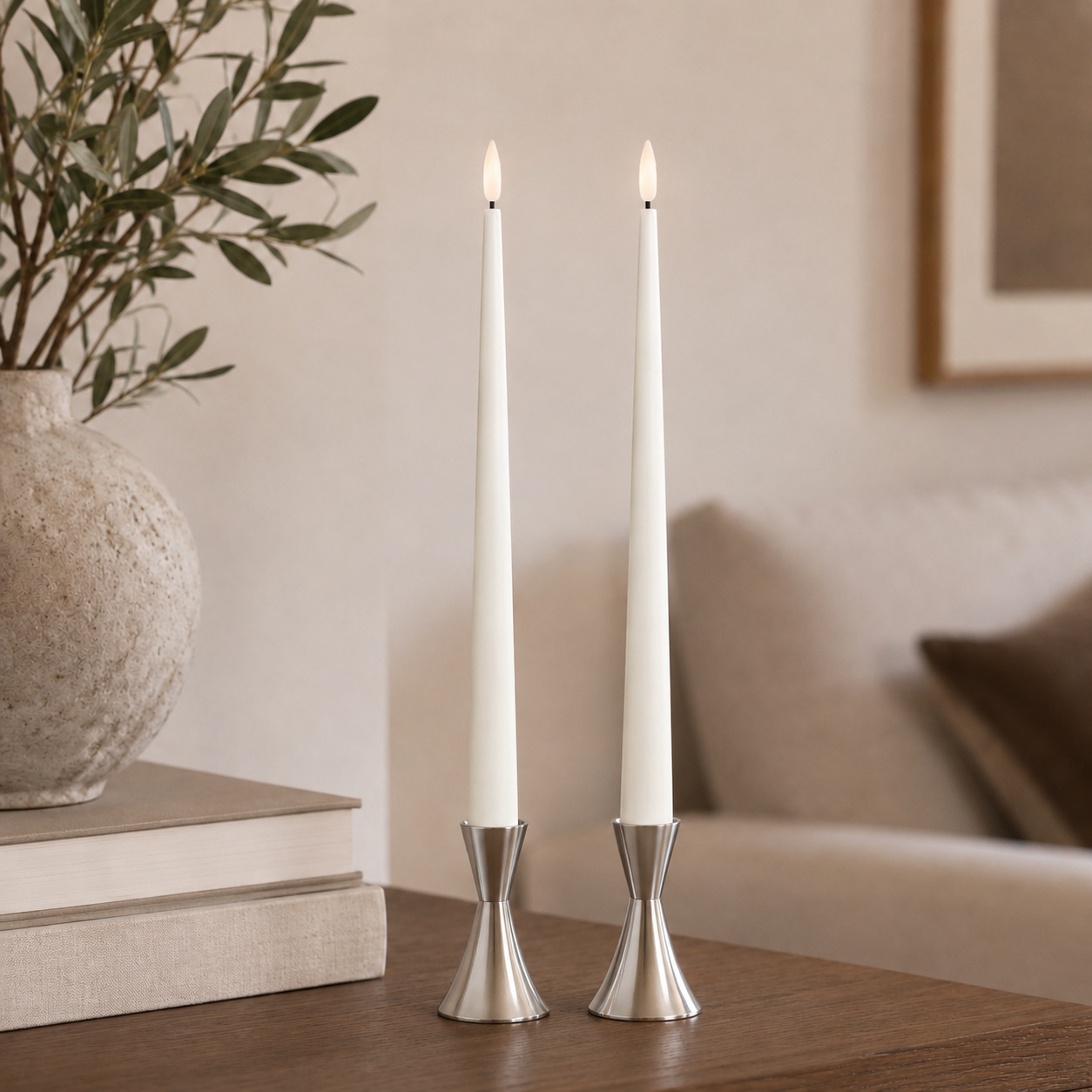 Lifestyle image showing ester & erik LED Taper Candles in 30cm length in colour Silky