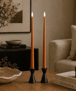 Lifestyle image showing ester & erik LED Taper Candles 40cm in length in colour: Raw Roffee