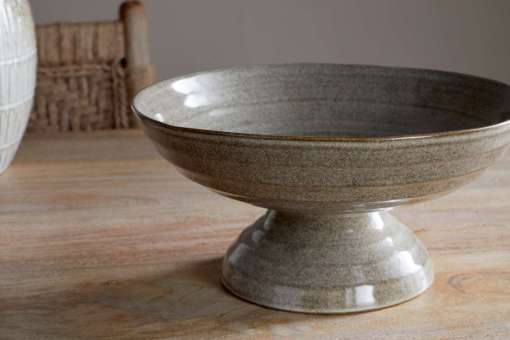 Close-up of the Valinha Earthenware Footed Bowl - Grey by Nkuku, showing the textured earthenware surface, spiral detail and tonal variation in the grey glaze.