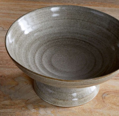 Close-up of the Valinha Earthenware Footed Bowl - Grey by Nkuku, showing the textured earthenware surface, spiral detail and tonal variation in the grey glaze.
