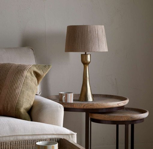 Marpha Antique Brass Table Lamp styled in a living space, bringing warm brass tones and understated character to the room.