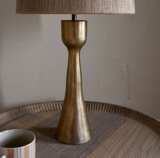 Close-up of the Marpha Antique Brass Table Lamp showing the warm antique brass finish and refined sculptural detailing.