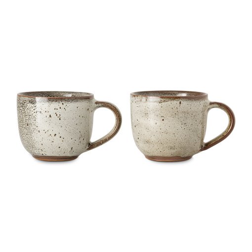 Close-up of the Cam Coffee Mug - Mocha by Nkuku, highlighting the mottled reactive glaze, handmade ceramic texture and warm mocha tones.