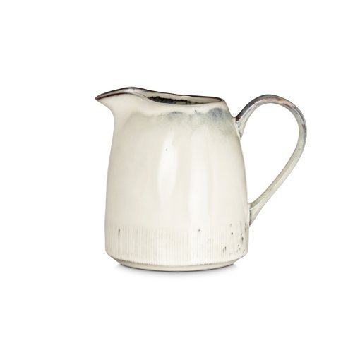 Malia Jug - Cream - Large by Nkuku showing the rounded stoneware body, 1890ml capacity, pouring lip, cream glaze variation and hand-painted line detail.