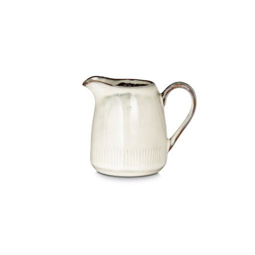 Close-up of the Malia Jug - Cream - Small by Nkuku, showing the cream glazed stoneware finish, subtle reactive variation and painted stripe detail.