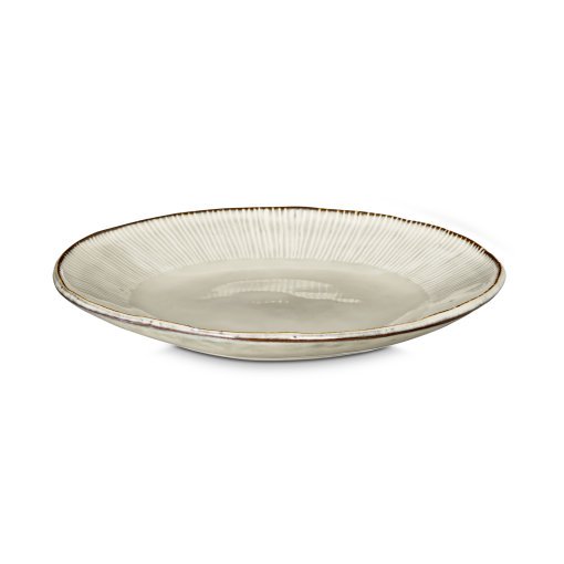 Close-up of the Malia Side Plate - Cream by Nkuku, showing the cream stoneware surface, fine hand-painted line detail and subtle glaze variation around the rim.