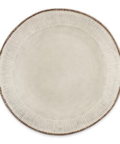 Close-up of the Malia Dinner Plate - Cream by Nkuku, showing the cream stoneware surface, subtle glaze variation and fine hand-painted line detail around the edge.