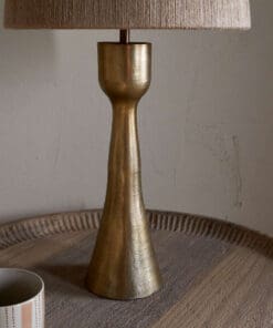 Close-up of the Marpha Antique Brass Table Lamp showing the warm antique brass finish and refined sculptural detailing.