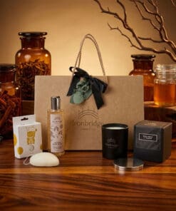 Dark Honey & Tobacco Candle & Skin Care Gift Set – Everyday Treat presented as a premium gift with warm golden lighting and natural styling.