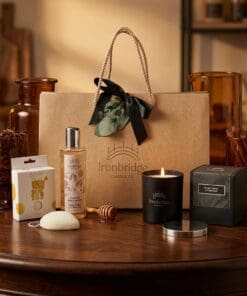 Dark Honey & Tobacco Candle & Skin Care Gift Set – Everyday Treat in a sophisticated lifestyle setting with dark wood, amber tones and subtle fragrance-inspired details.