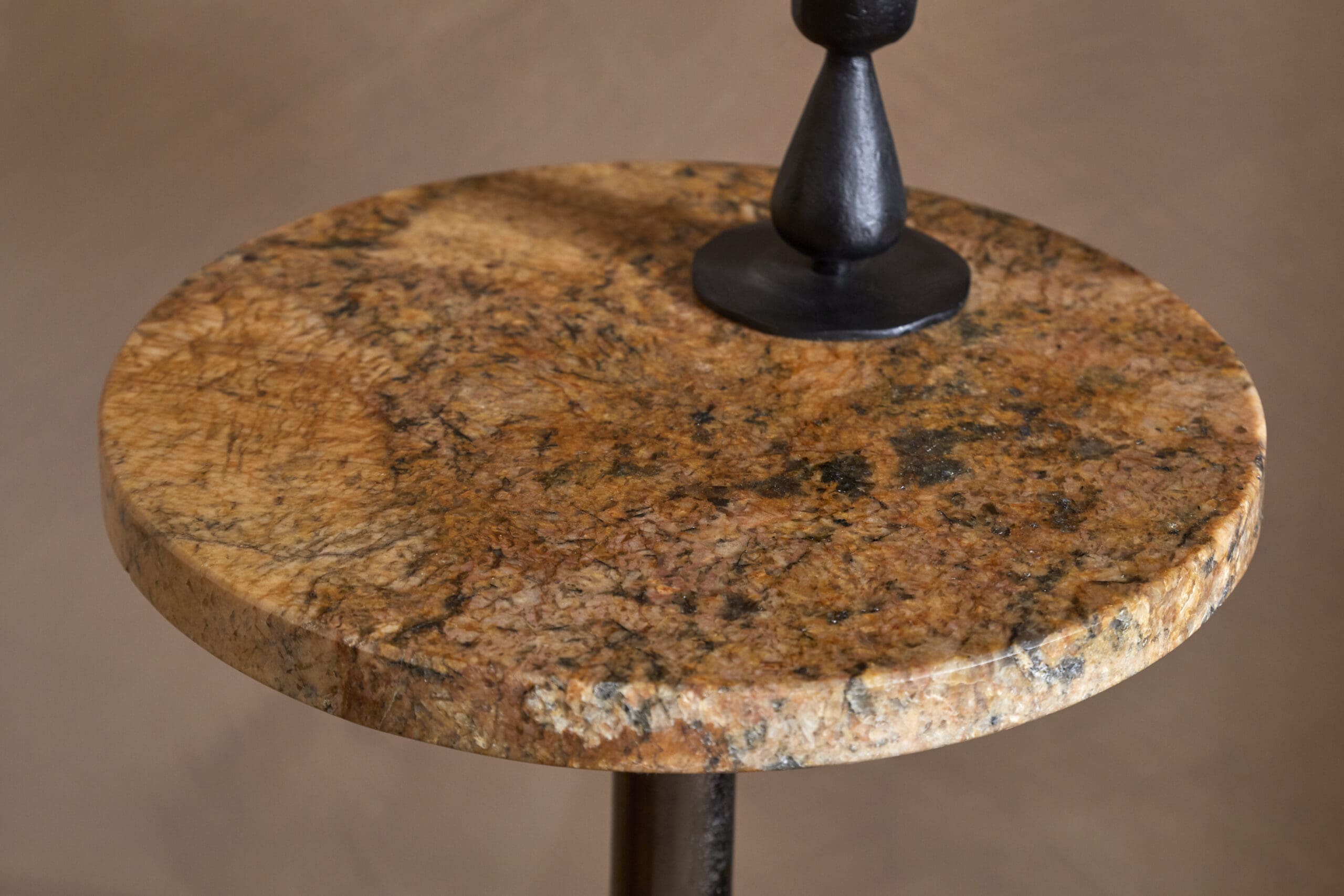 Israj Marble & Iron Side Table - Aged Black showing the marble top with brown hues