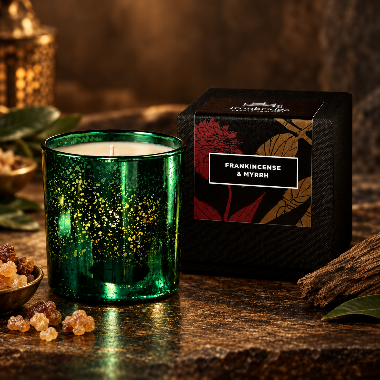 Frankincense & Myrrh Luxury Scented Candle in Limited Edition emerald electroplated glass with branded gift box and warm woody fragrance accents.
