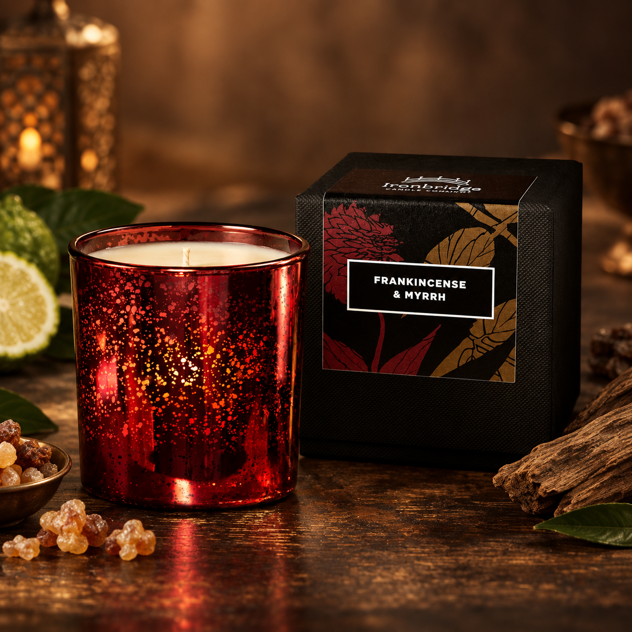 Frankincense & Myrrh Luxury Candle in ruby electroplated glass with branded gift box, styled with frankincense resin and warm woody accents.
