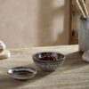 Cam Dipping Bowls in Mocha by Nkuku, set of two with a softly mottled cream and mocha glaze.