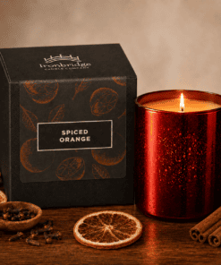 Spiced Orange Luxury Scented Candle in an Electroplated Ruby Glass - lit