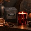 Christmas Spice Luxury Candle in ruby electroplated glass with branded box, dried orange, cinnamon, cloves and star anise.